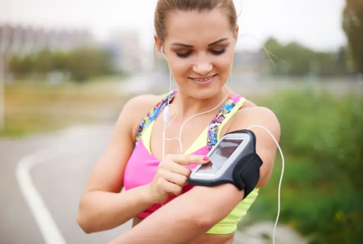 Woman tracks goals and progress on health app
